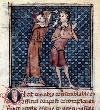 Figura anatomica: medico che esamina l