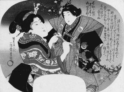 Aiban uchiwa-e: Una donna che veste il suo bambino da Utagawa Kunisada