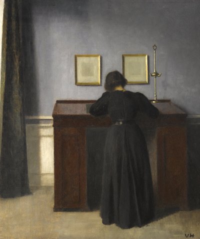 Ida in piedi a una scrivania, 1900 da Vilhelm Hammershoi