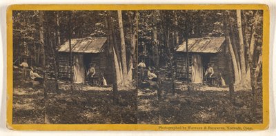 [Famiglia in posa davanti alla loro casetta di legno nel bosco]. da Whitney and Beckwith