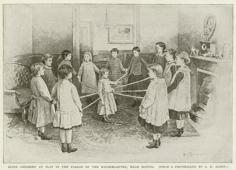 Bambini ciechi che giocano nel salotto dell