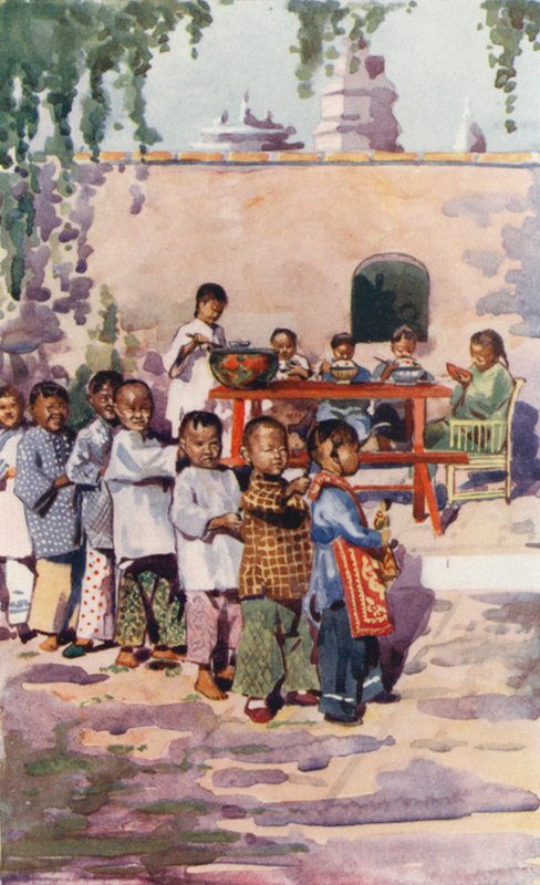 Bambini della Cina: bambini a tavola e a giocare da English School