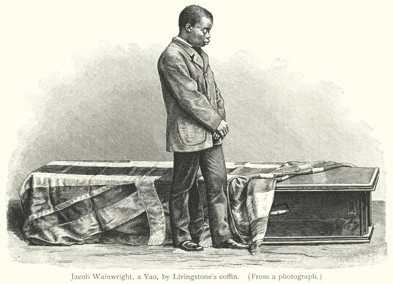 Jacob Wainwright, un Yao, accanto alla bara di Livingstone da European School
