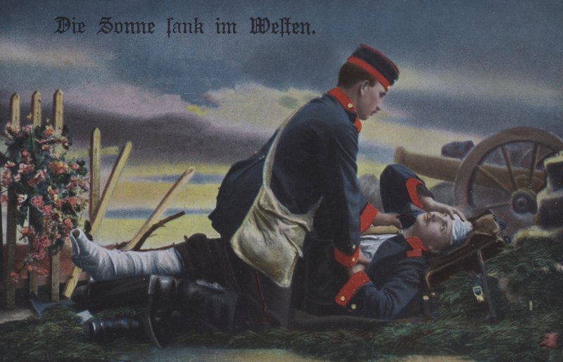 Il sole tramonta a ovest: un soldato tedesco conforta il suo compagno morente sul campo di battaglia da Photographer German
