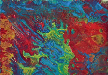 Astratto: tecnica del pour con colori acrilici in rosso, blu e giallo