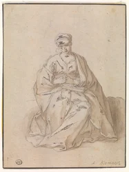 Maria seduta con un libro