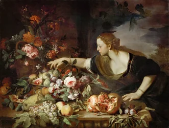 Donna che prende frutta