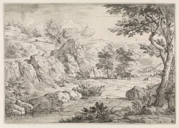 Paesaggio collinare con stagno