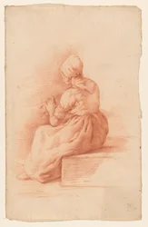 Donna seduta con cappello, vista di spalle