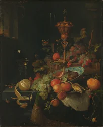 Natura morta con frutta e un bicchiere su una zampa di gallo