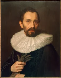 Ritratto di un uomo che tiene i guanti, leggermente a sinistra