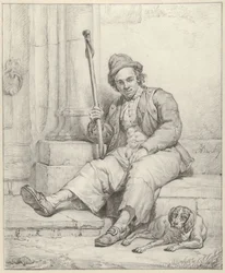 Uomo seduto con cane