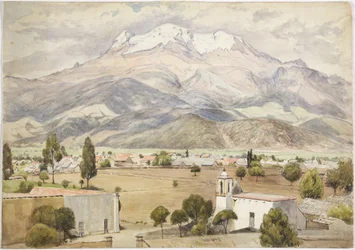 Villaggio in primo piano e montagne sullo sfondo