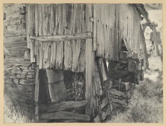 Recinzione di legno attorno a una ruota del mulino