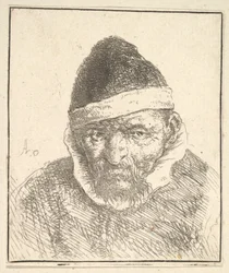Vecchio con colletto bianco e cappello a punta