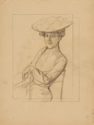 Donna seduta con cappello