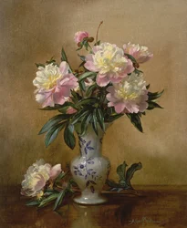 Peonie in un vaso blu e bianco
