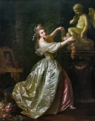 Giovane donna che decora la statua dell