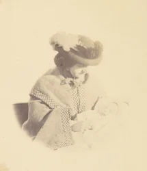 [Ritratto vignettato, donna che tiene un bambino]