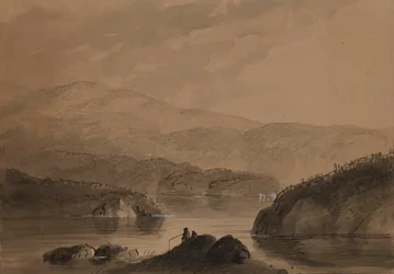 Veduta di uomini che pescano da una roccia in un lago
