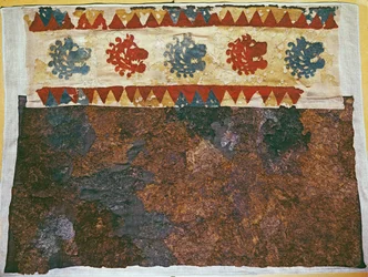 Arazzo decorato con teste di leone