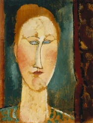 Testa di una donna con capelli rossi