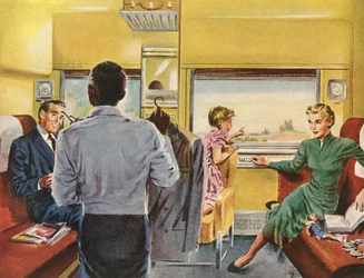 Famiglia che gode di una cabina di prima classe durante un viaggio in treno