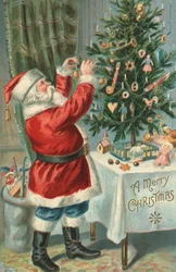 Babbo Natale che decora un albero di Natale