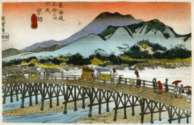 Geografia. Il bagliore del mattino al Nihonbashi (55ª stazione). Xilografia di Hiroshige in: Cinquantatré stazioni del Tokaido (1833-1834). Cartolina, Giappone, c.1900