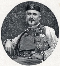 Ritratto di Nicola I del Montenegro (Nikola I Petrović-Njegoš) (Petrović-Njegoš) (1841-1921), principe del Montenegro e dei Brda. Incisione in «Les Missions Catholiques au XIXe Siecle» di Louis-Eugène (Louis Eugène) Louvet. Collezione privata.