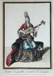 Signora che suona la chitarra