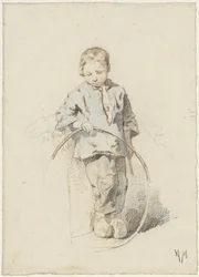 Ragazzo in piedi con un cerchio