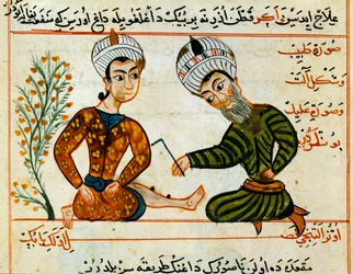 Cauterizzazione di una ferita. Miniatura da un manoscritto di medicina araba. XV secolo Parigi, B.N.