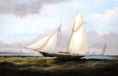 Una goletta sotto vela leggera, con la sua vela di prua abbassata