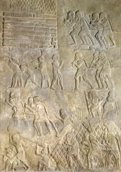 Rilievo che raffigura portatori che portano legna alla costa per il trasporto via mare dal Palazzo di Sargon II, Khorsabad, Iraq