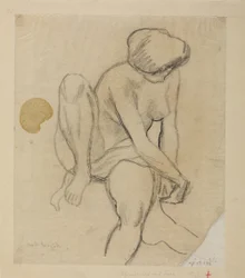 Nudo femminile seduto con telo