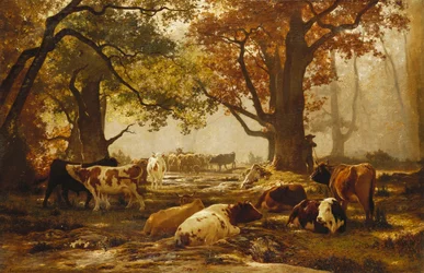 Bovini in un paesaggio fluviale boscoso