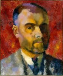 Autoritratto di Augusto Giacometti su sfondo rosso