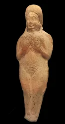 Figurina di donna nuda. Terracotta, Babilonia, II millennio a.C. Museo de la Castre, Cannes