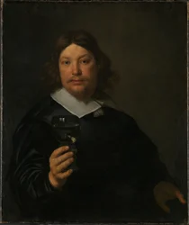 Uomo con un bicchiere di vino