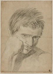 Busto di giovane uomo con il mento appoggiato sulla mano