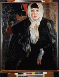 Ritratto di donna. Bella donna dal volto malinconico, in strada, con la testa coperta dalla sciarpa, vestita di un grande cappotto nero, appoggiata con nonchalance e con una delicata mano in un guanto bianco visibile. Opera di Bo
