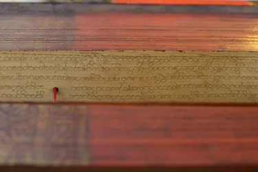 Manoscritto birmano su foglia di palma (legno e pergamena)