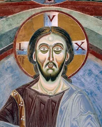 Volto di Cristo Pantocratore, Dettaglio degli affreschi romanici in stile bizantino, fine XI secolo, Cappella di San Eldrado e San Nicola, Abbazia di Novalesa, Piemonte, Italia