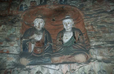 Cina, provincia di Shanxi, statue di Buddha in arenaria nelle grotte di Yungang