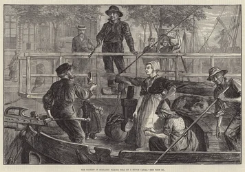 Il turista in Olanda, pagando il pedaggio su un canale olandese