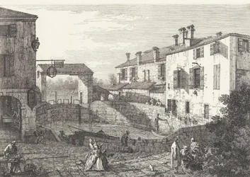 Le chiuse di Dolo, un bacino a forma ovale con barche al centro, edifici su entrambi i lati