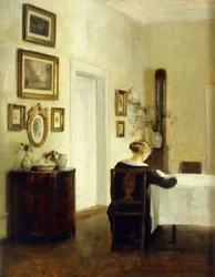Una Donna a un Tavolo in un Interno