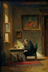 Monaco studioso alla scrivania