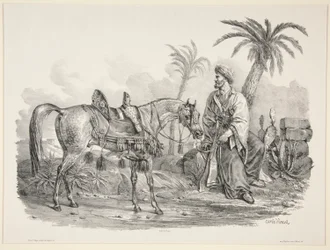 Arabo seduto che tiene le briglie di un cavallo arabo